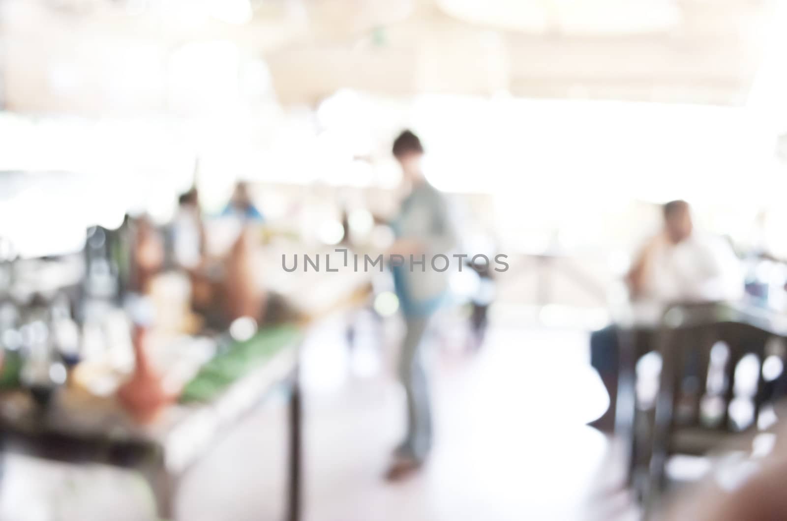 blurred background of people in restaurant by rakoptonLPN