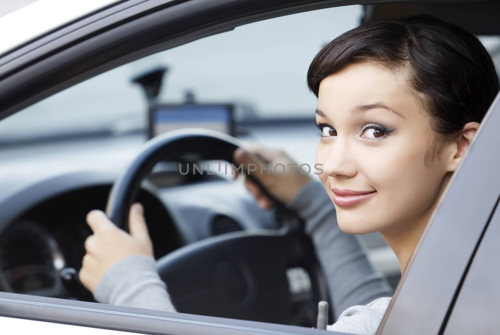 Pretty girl in a car