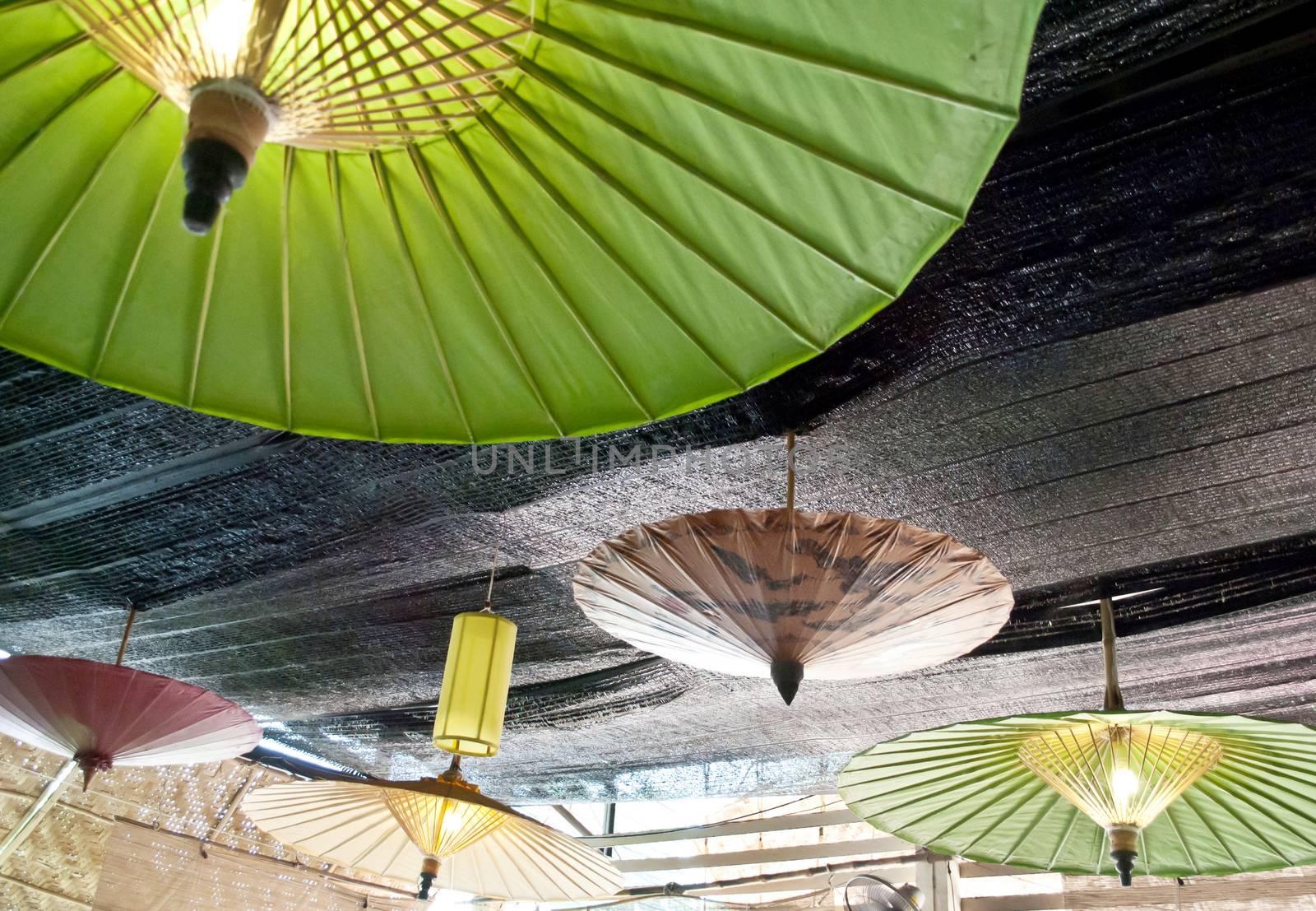 Under an color umbrella with lighting downlight by rakoptonLPN