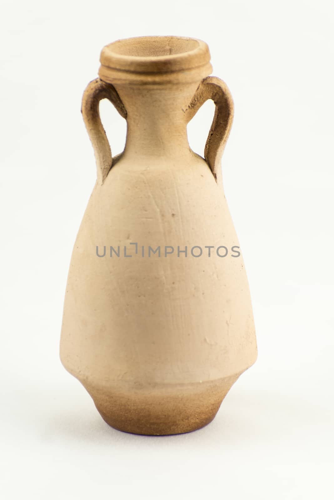 Ancient terracotta vase isolated on white background