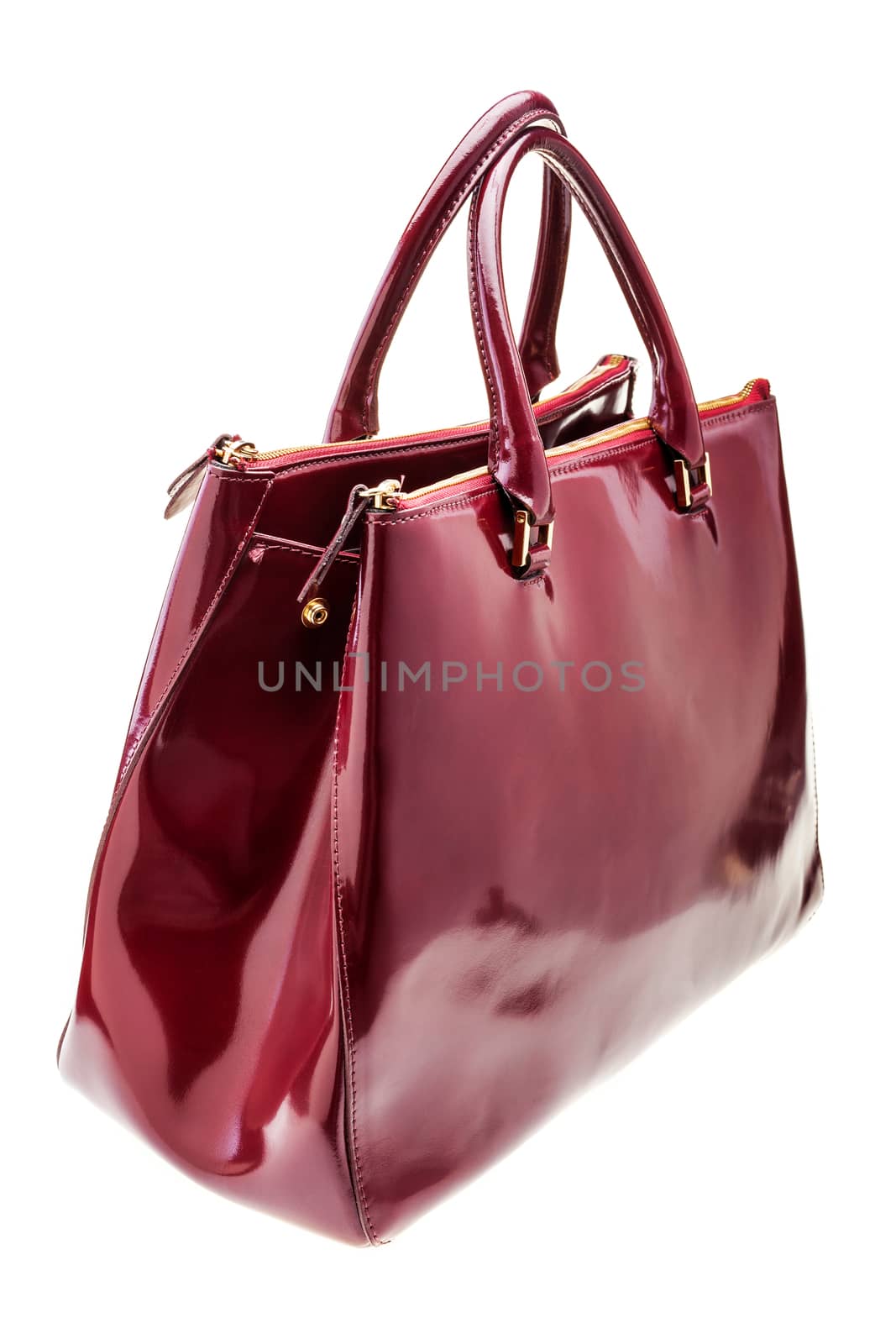 New dark red womens bag isolated on white background.