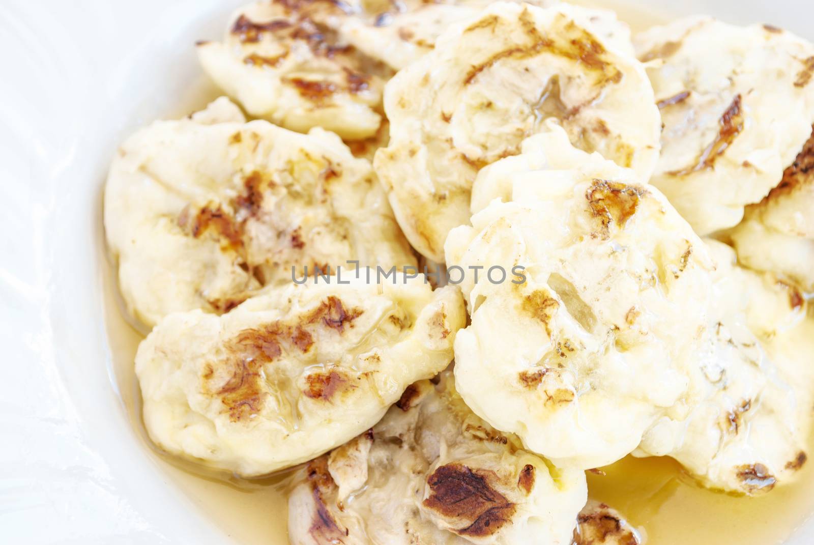 Grilled bananas with syrup, dessert in Thailand by rakoptonLPN