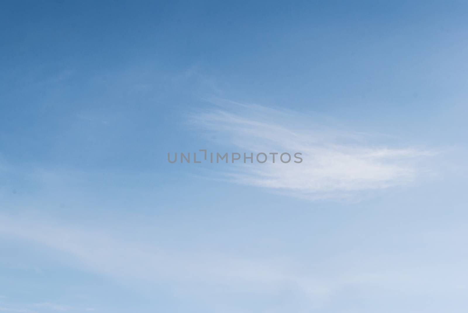 white fluffy clouds in the blue sky, for background