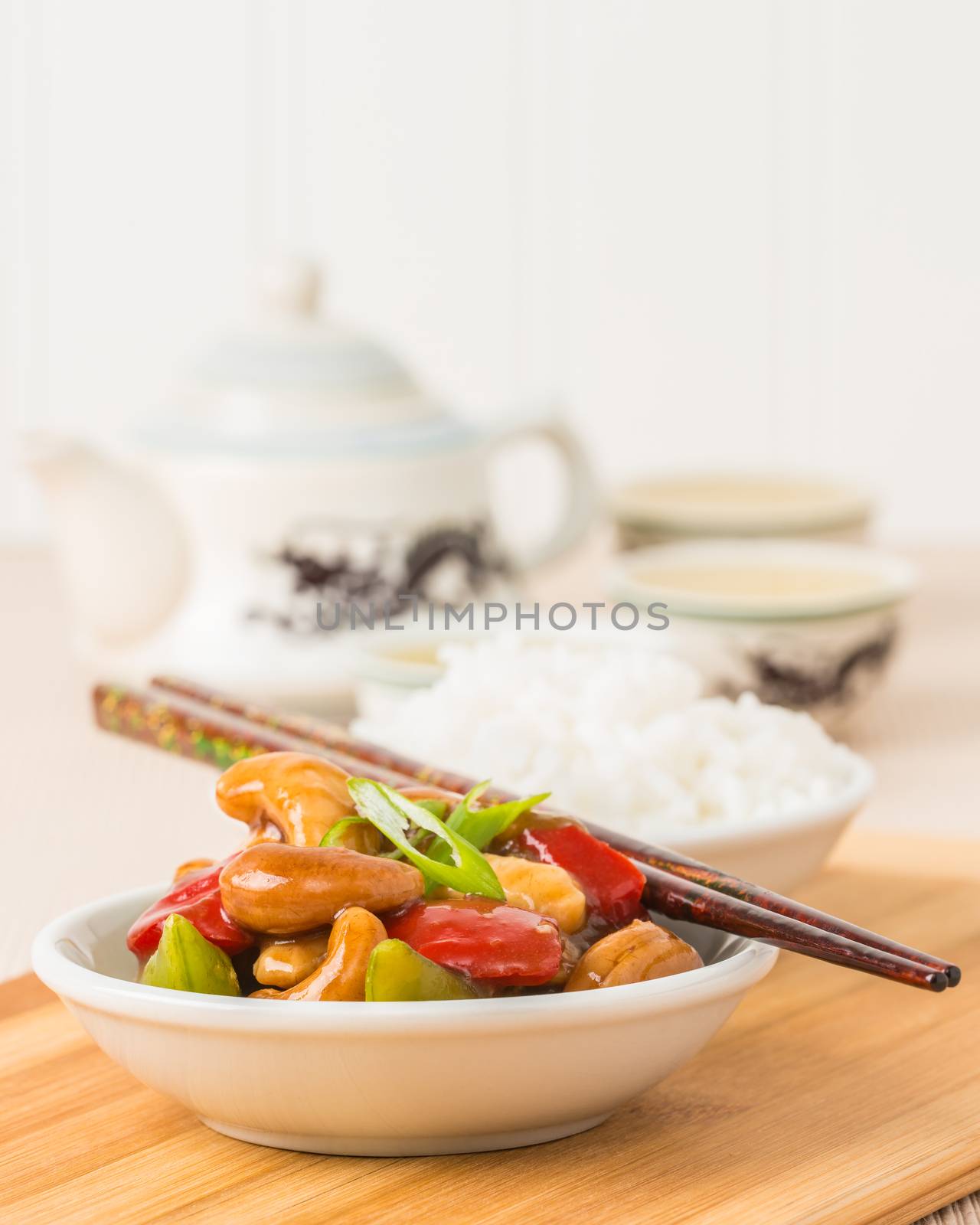 Bowl of Chinese cashew chicken photographed closeup.