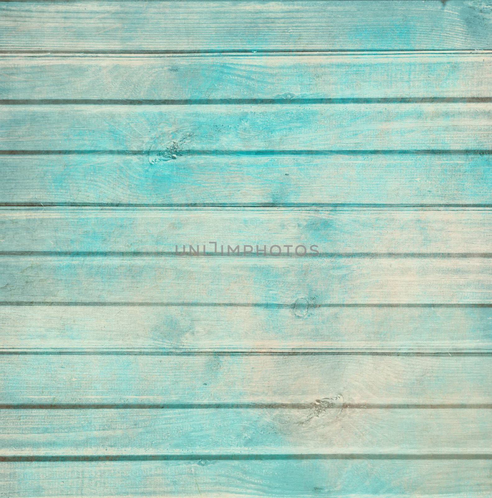 Rustic old plank background in turquoise, mint and beige colors with textured scratches and antique cracked paint for scrapbooking and decoupage