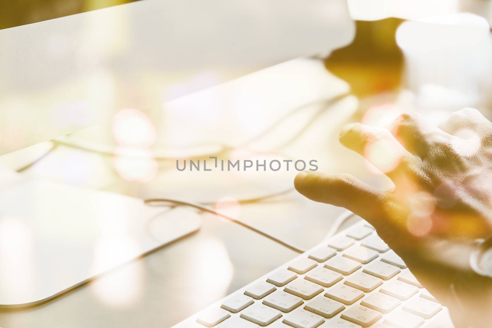 Image of People using computer double exposure and blurred view of car on street at night