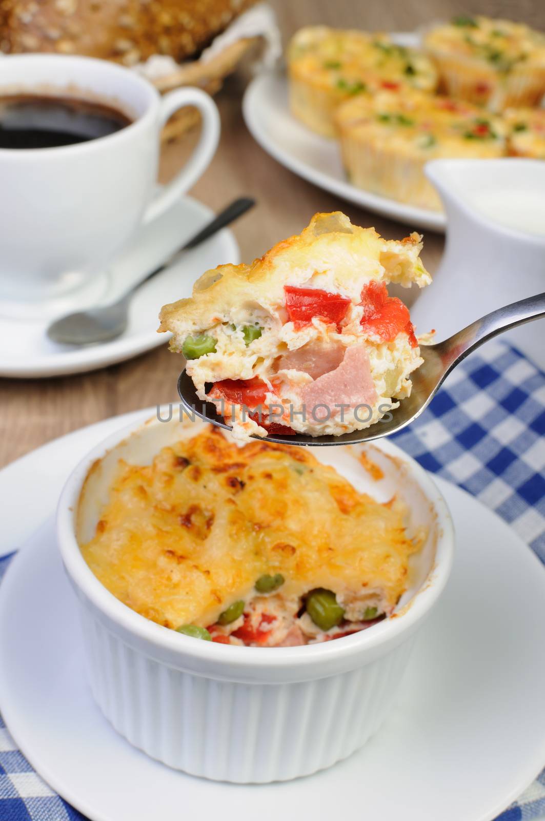 Baked vegetable casserole portion ham with cheese