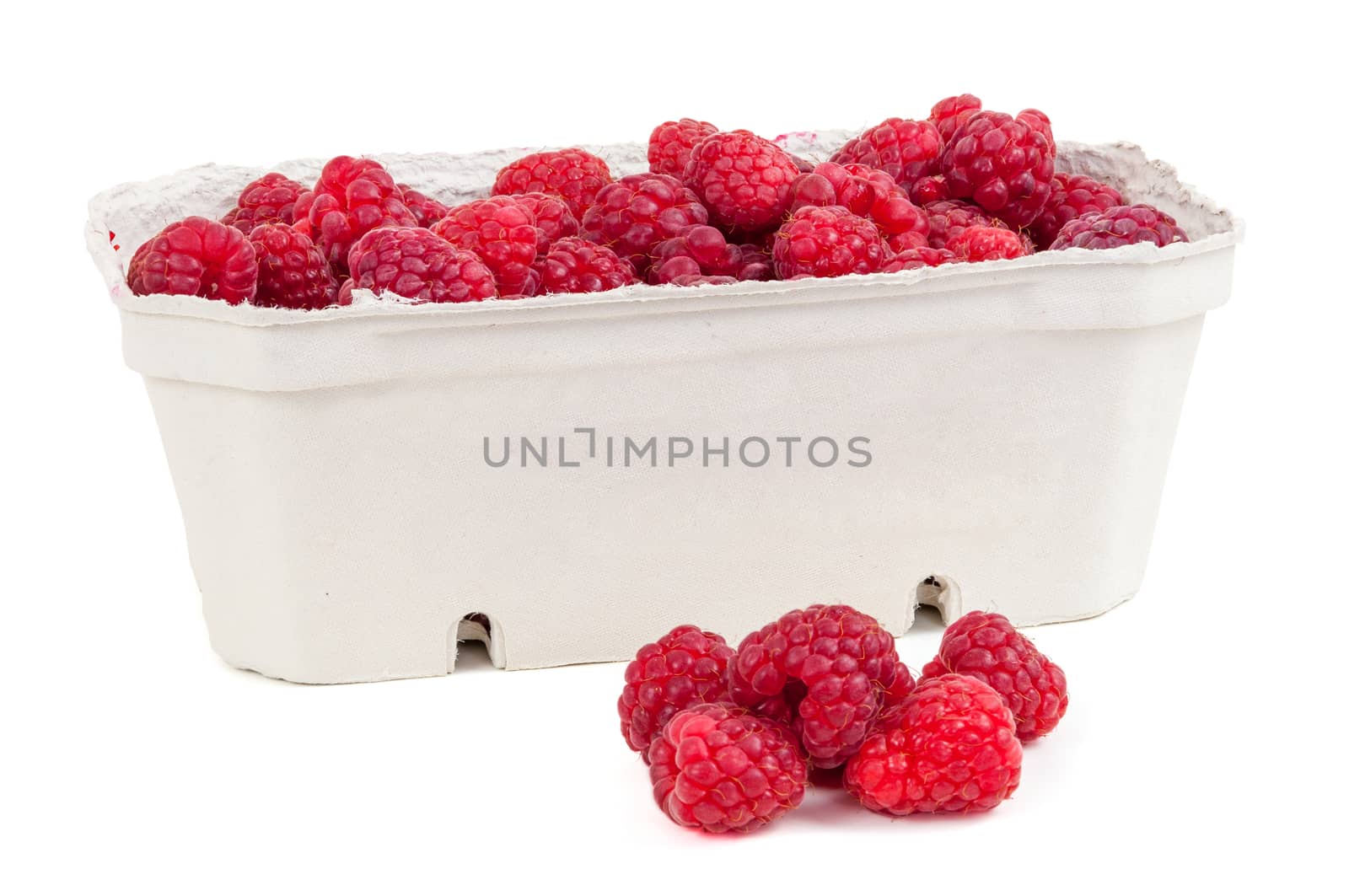 Raspberries in the box isolated on white background with clipping path