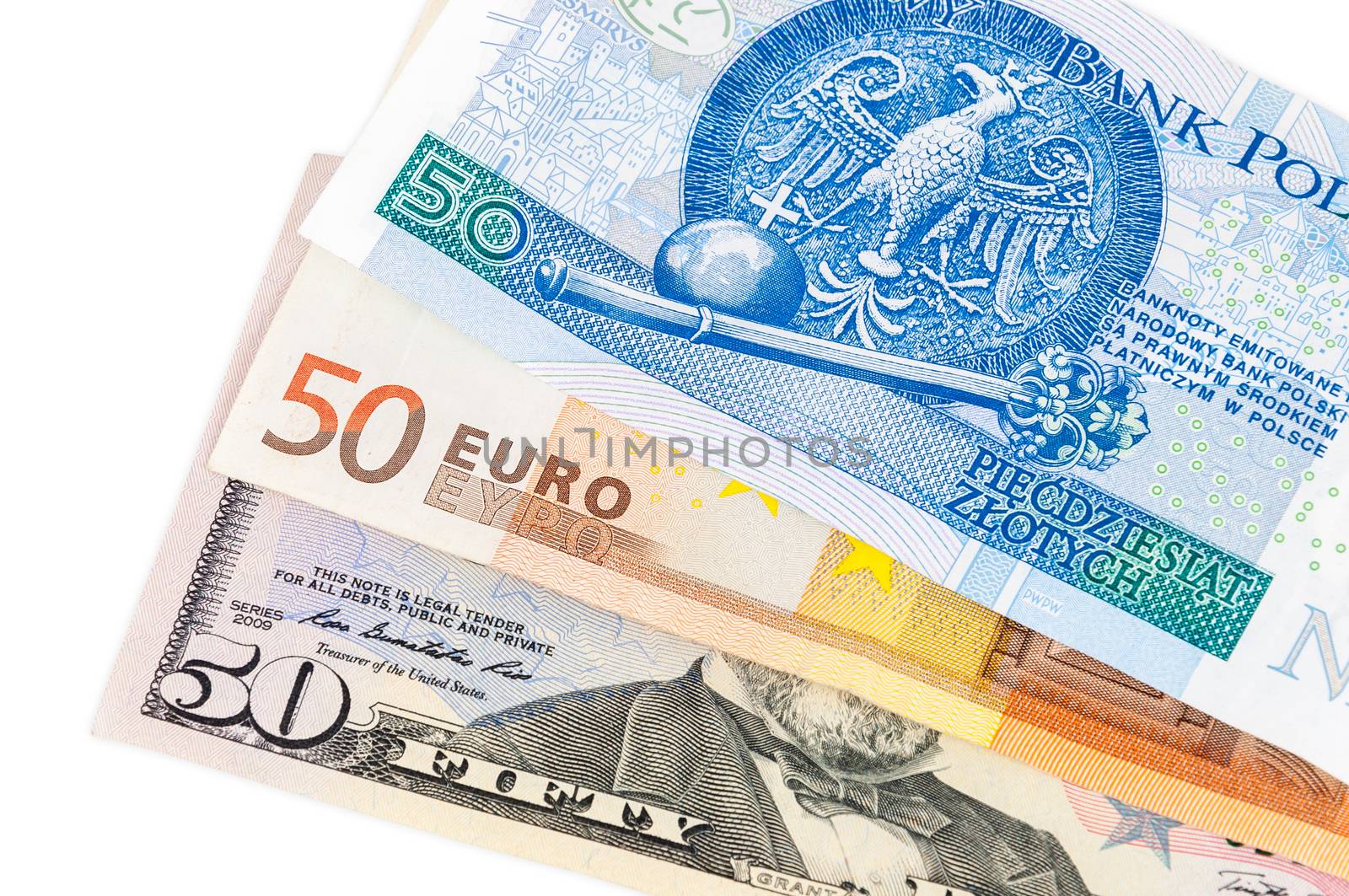Banknotes of 50 dollars euro and polish zloty isolated on white background with clipping path