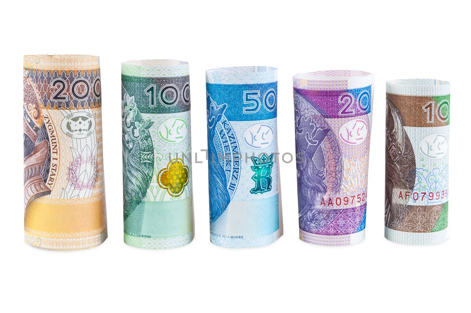 Rolled polish zloty new banknotes isolated on white background with clipping path