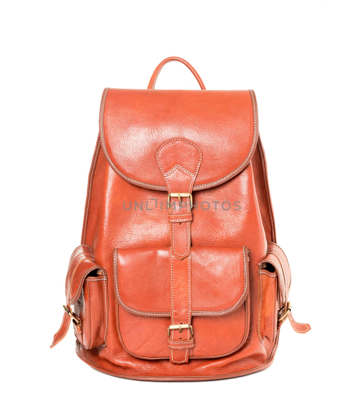 Orange leather backpack standing isolated on white background