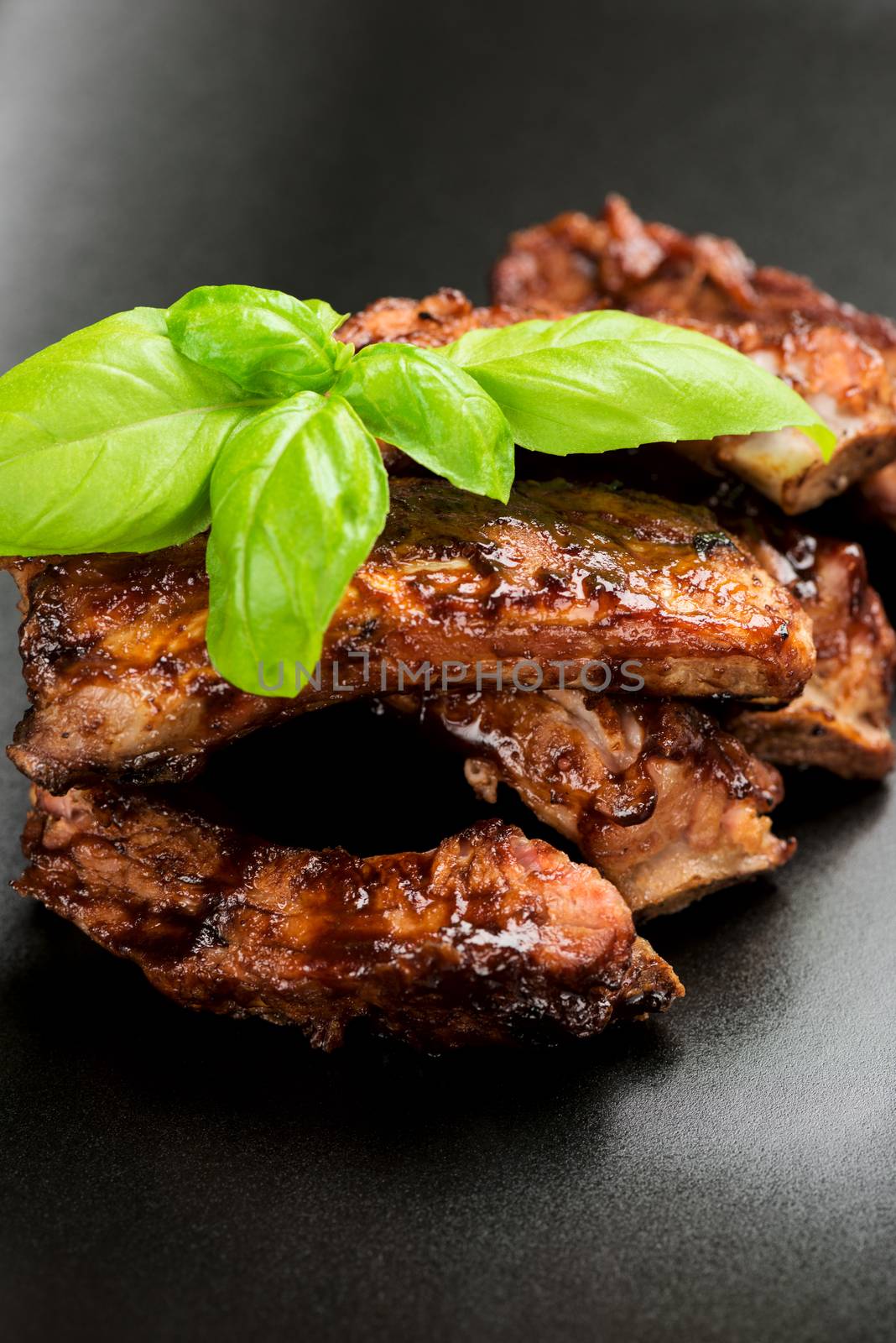 Barbecued ribs with oregano leaf