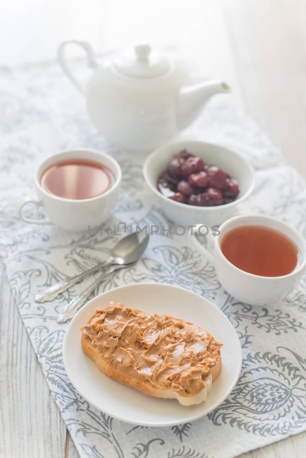 Breakfast with peanut butter sandwich and jam