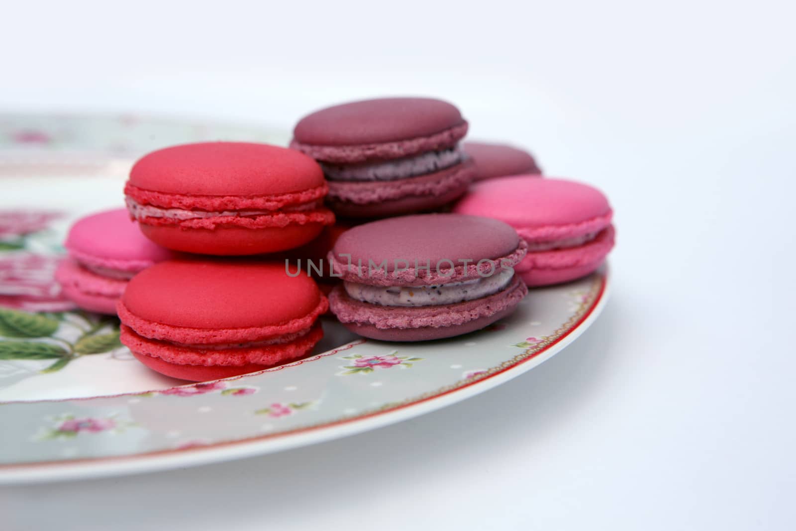 French colorful macaroons isolated on  white by ohhlanla