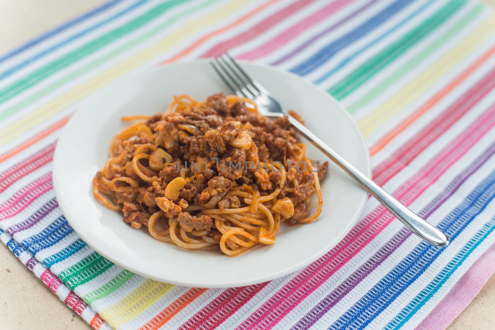 Spaghetti with meat in the white plate by Linaga