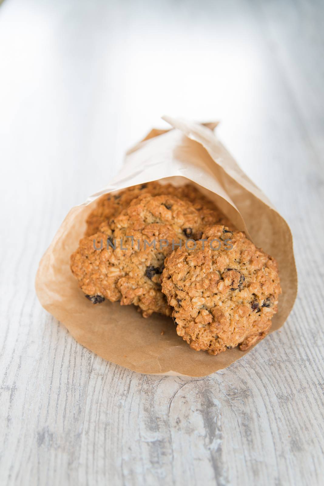 Oatmeal cookies in the craft paper bag