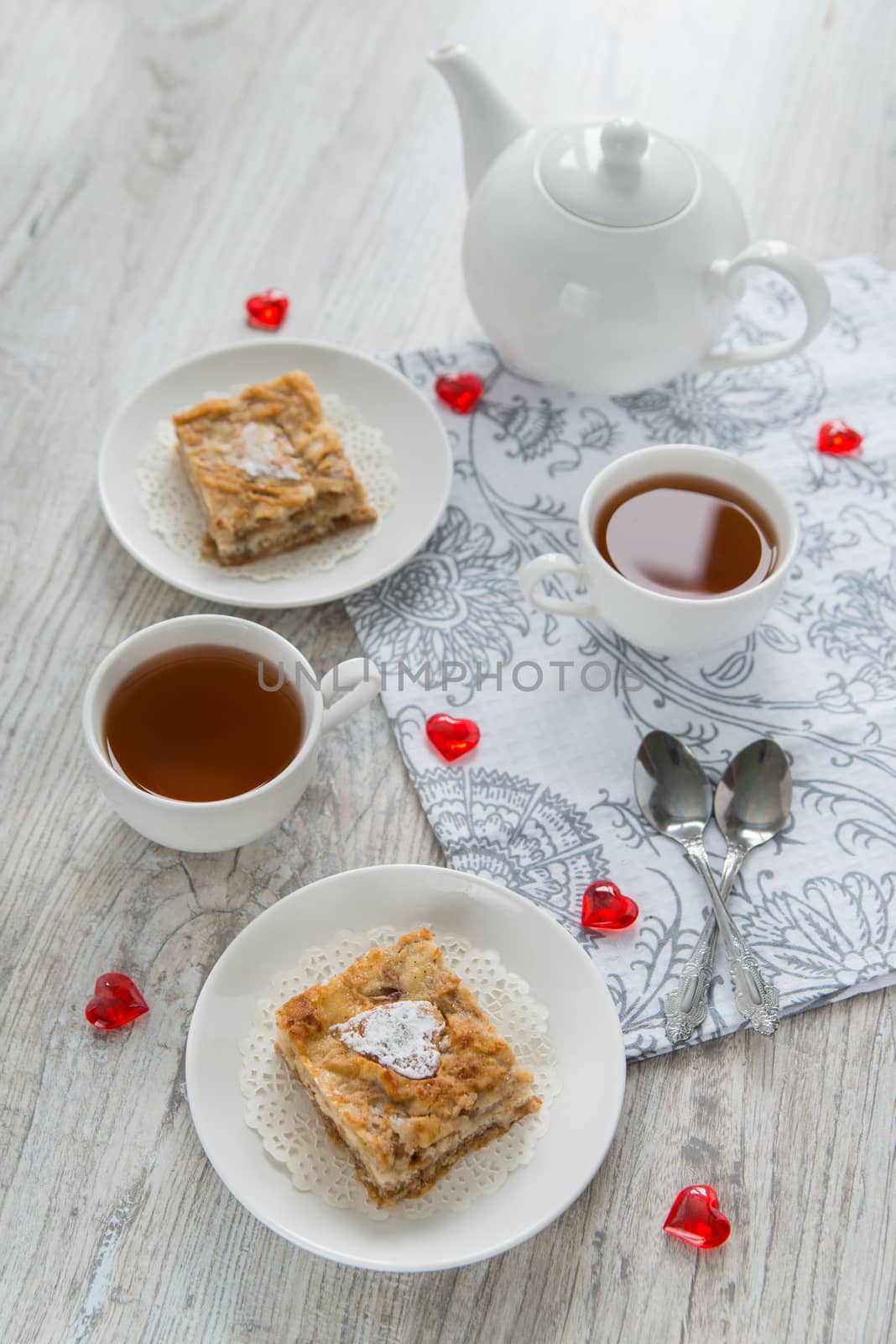 Two pieces of apple pie with tea by Linaga