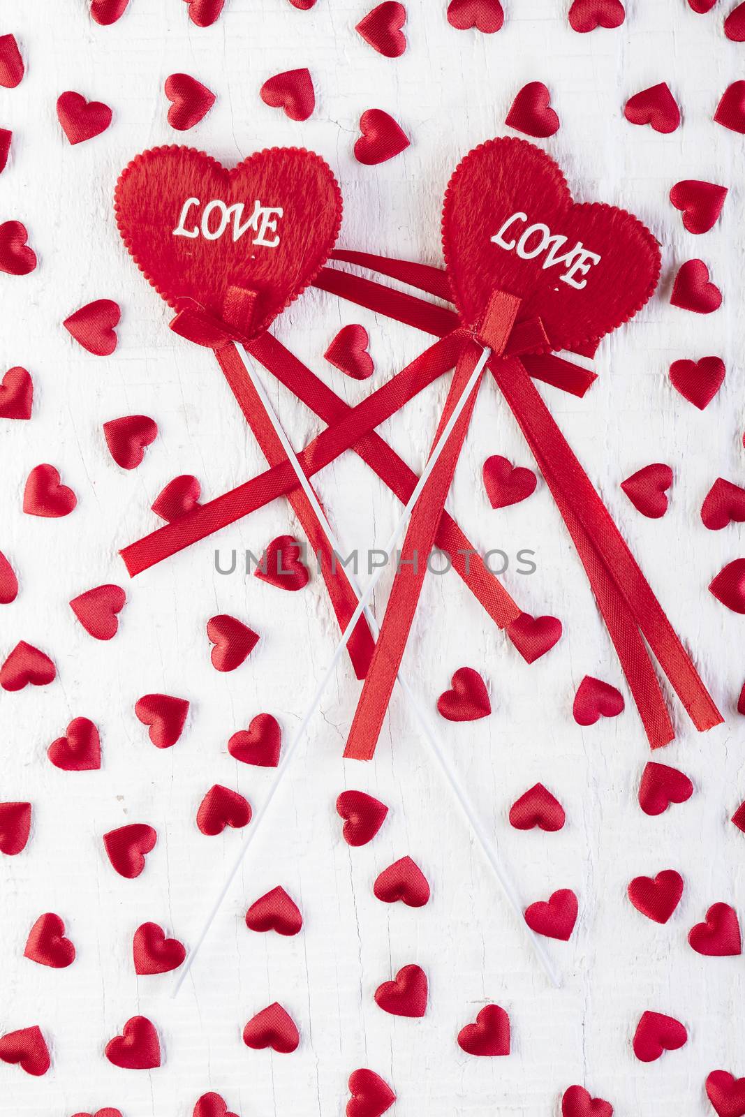 Love hearts on wooden texture background by manaemedia