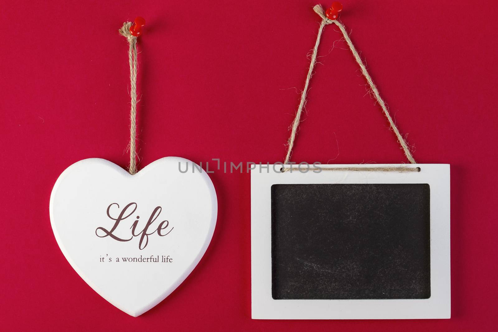 Love heart and emty blackboard on red by manaemedia