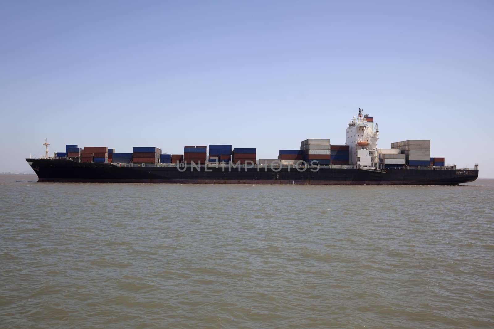 cargo ship sailing in the ocean