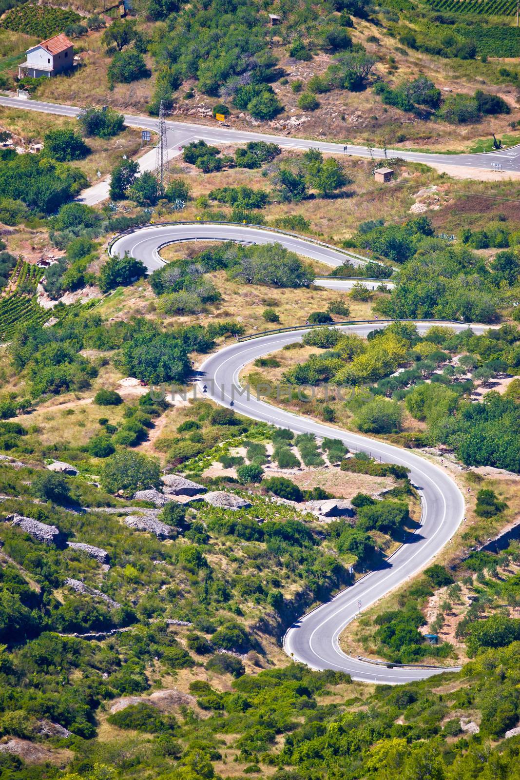 Island of Vis curvy road vertical view, Dalmatia, Croatia