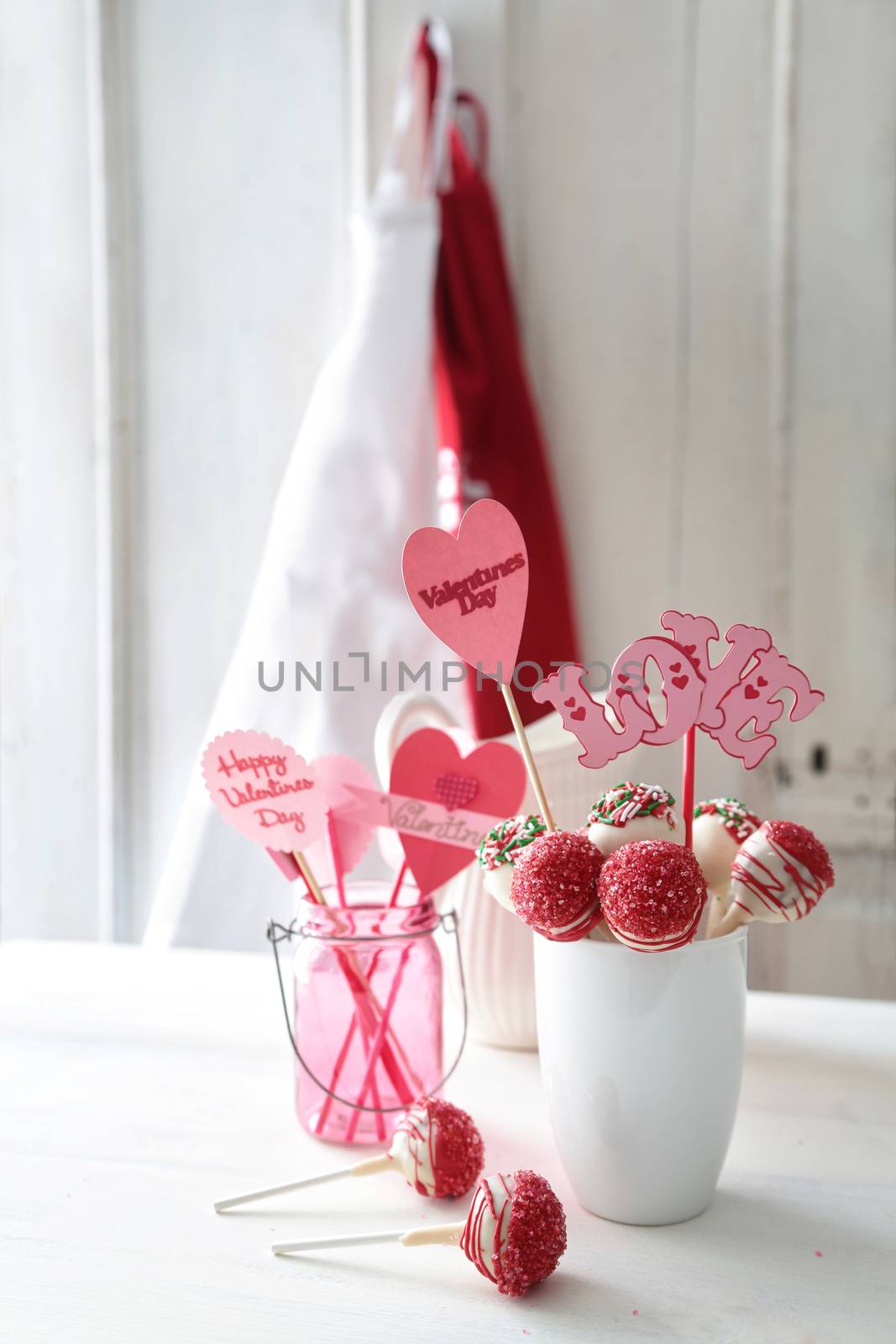 Red and white cake pops with decorations for Valentine's Day
