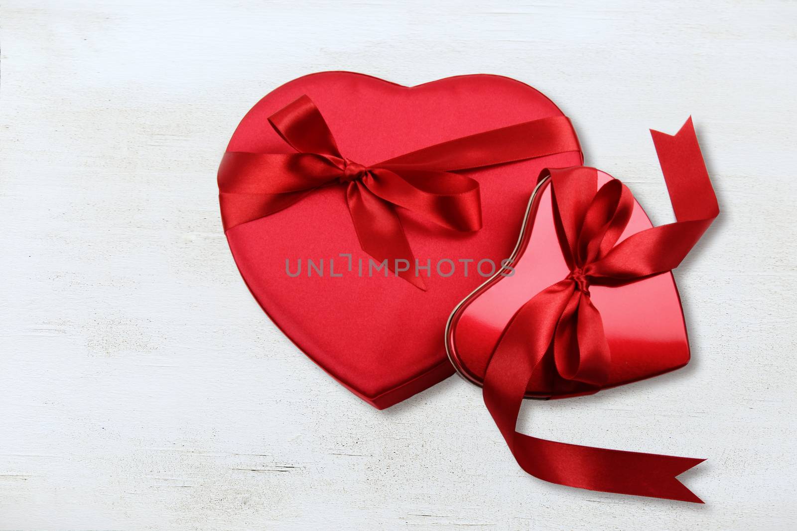 Boxes of chocolate against a wood background