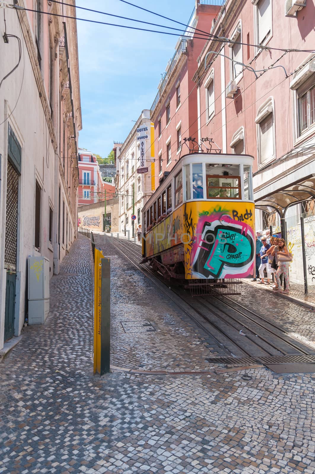 LISBON, PORTUGAL - AUGUST 23: The Gloria Funicular is a funicular that links Baixa with Bairro Alto districts in Lisbon on August 23, 2014. The Glória Funicular was opened to the public on October 24, 1885