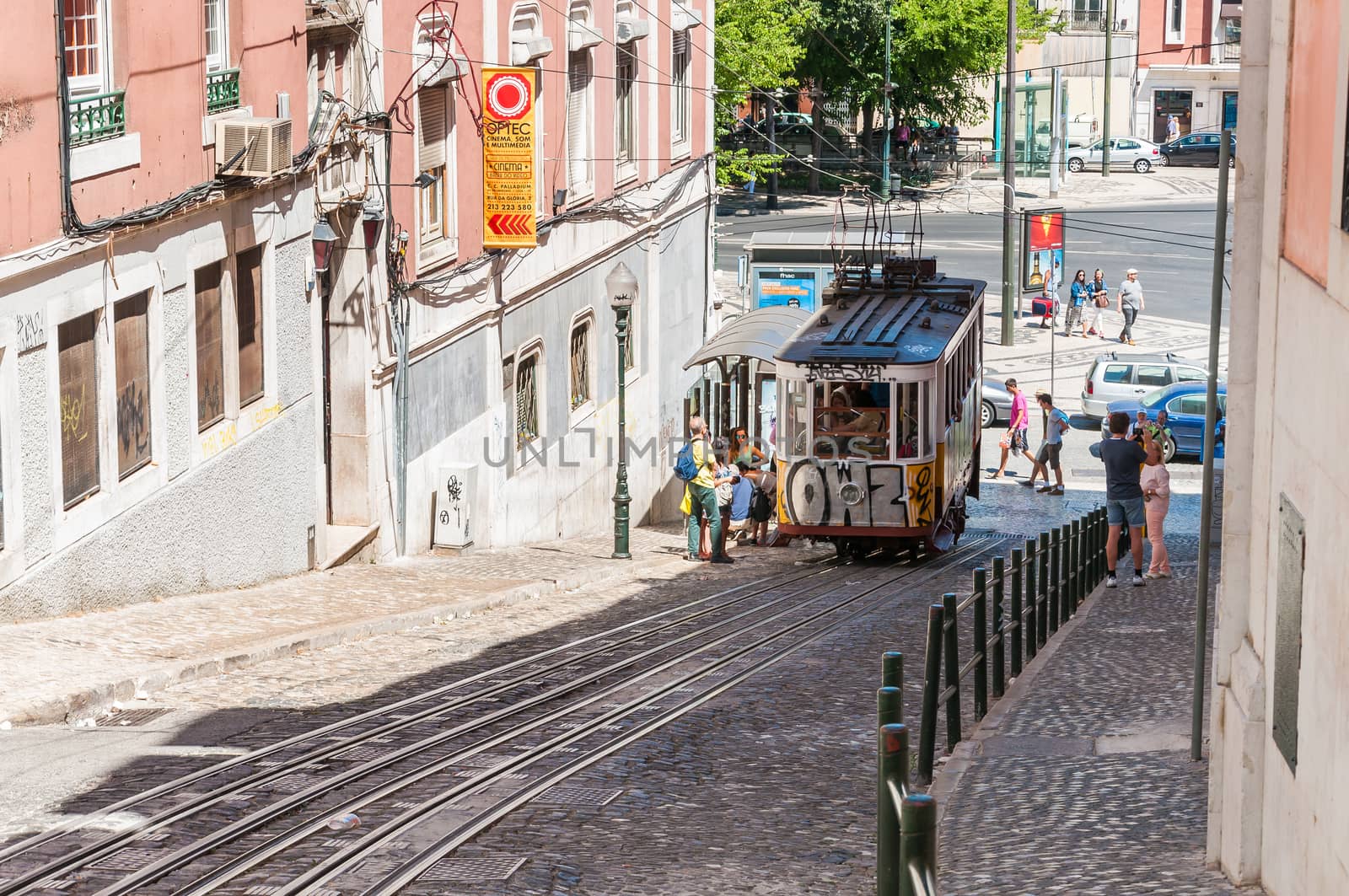 LISBON, PORTUGAL - AUGUST 23: The Gloria Funicular is a funicular that links Baixa with Bairro Alto districts in Lisbon on August 23, 2014. The Glória Funicular was opened to the public on October 24, 1885