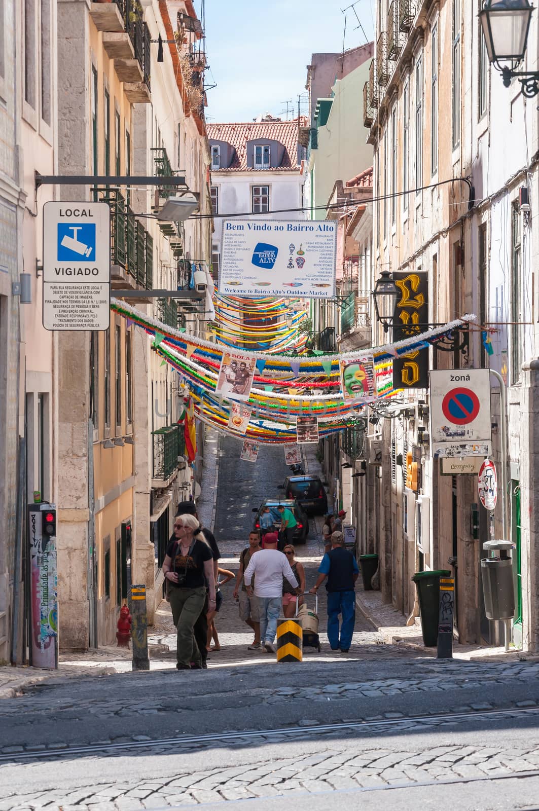 LISBON, PORTUGAL - AUGUST 23: Travessa da Queimada - street decorated with garlands in Lisbon downtown on 23 August, 2014.