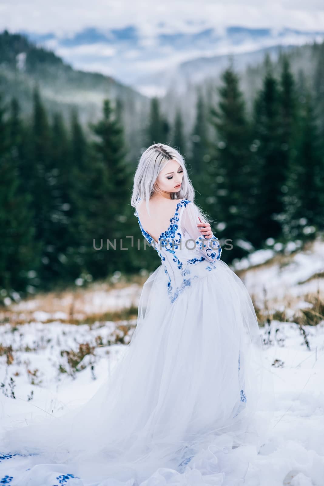 bride in white in the mountains Carpathians by Andreua