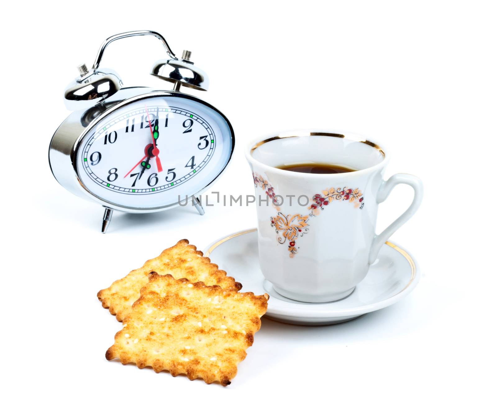 cup of coffee and watch on a white background