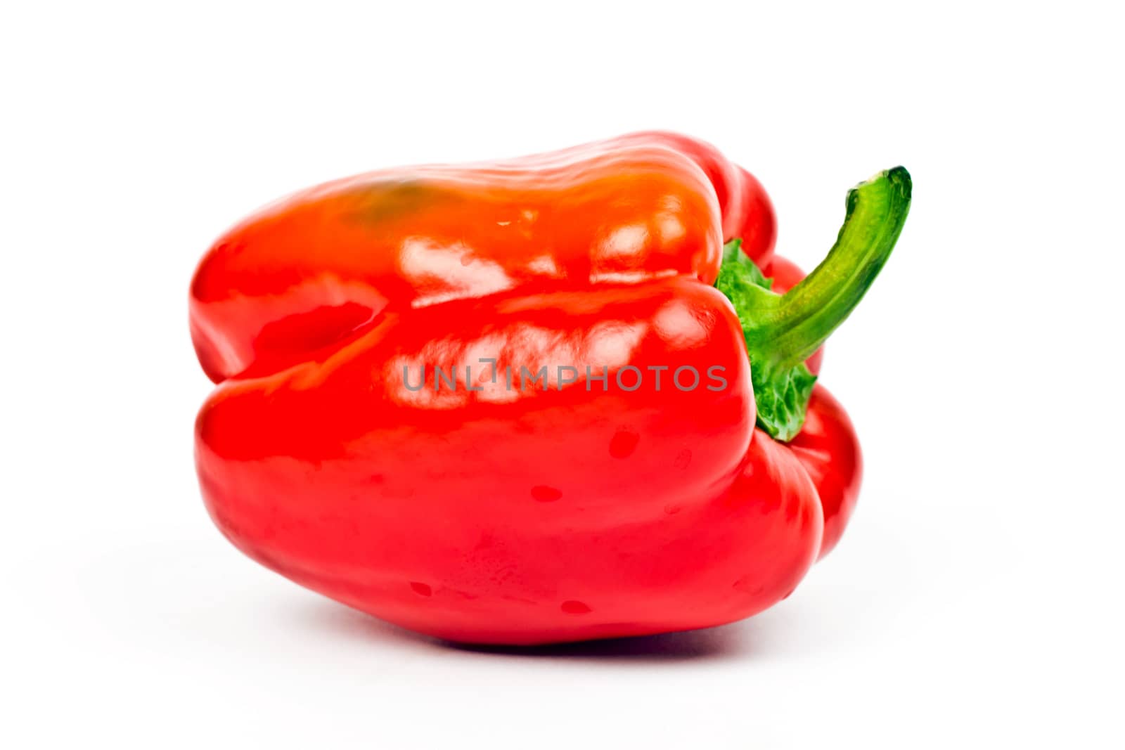 fresh red peppers on a light background