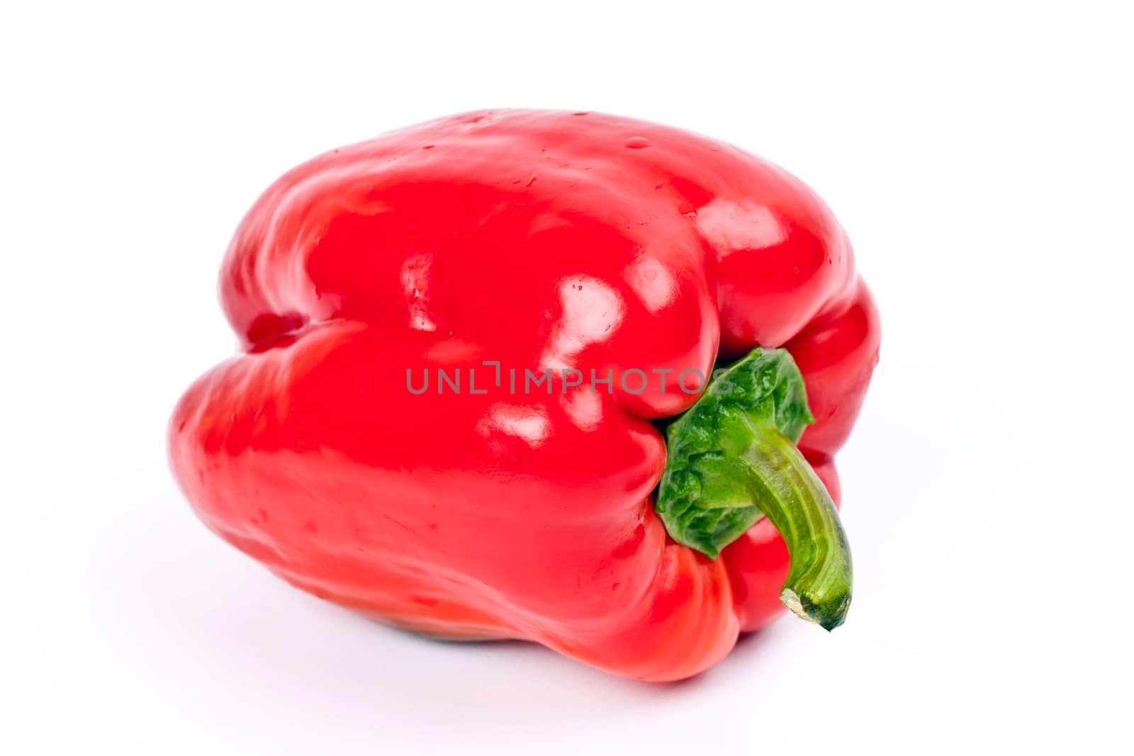 fresh red peppers on a light background