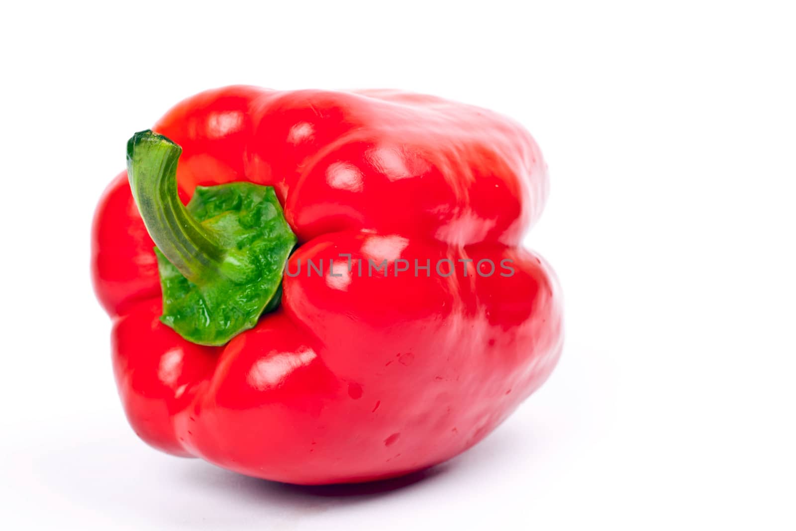 fresh red peppers on a light background