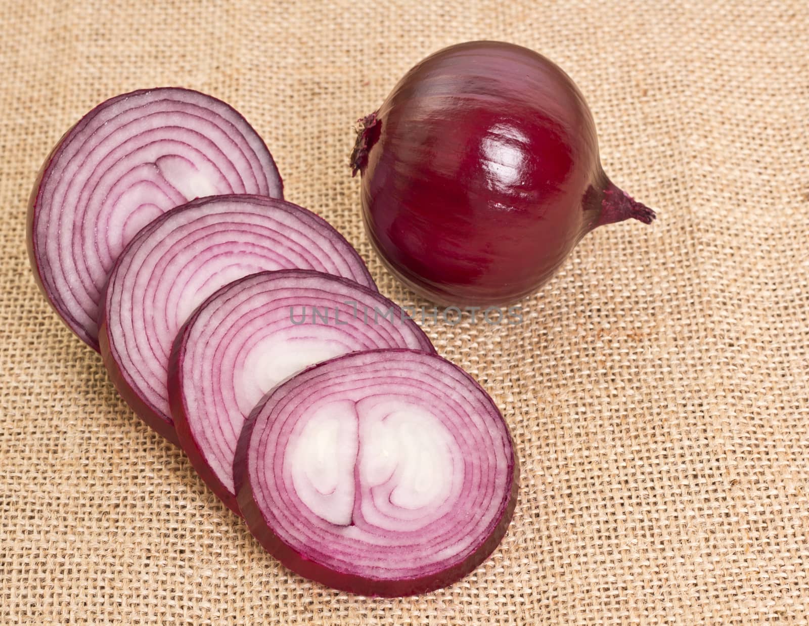 fresh onion on sacking by aziatik13