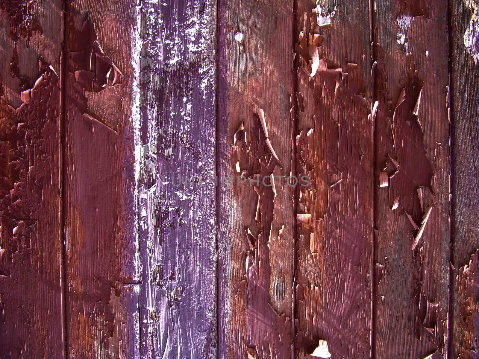 Flaking paint on old wood