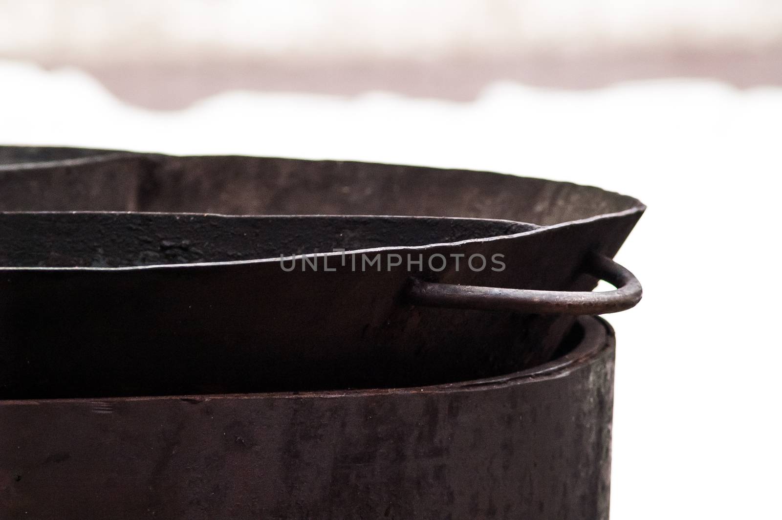 big metal frying pan for cooking in the field field