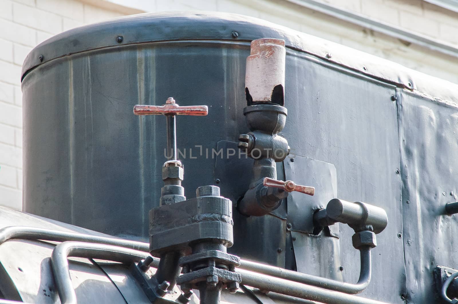 the old black locomotive and its details close-up