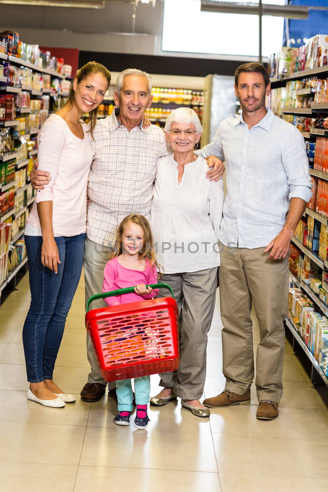 Portrait of smiling extended family at the supermarket