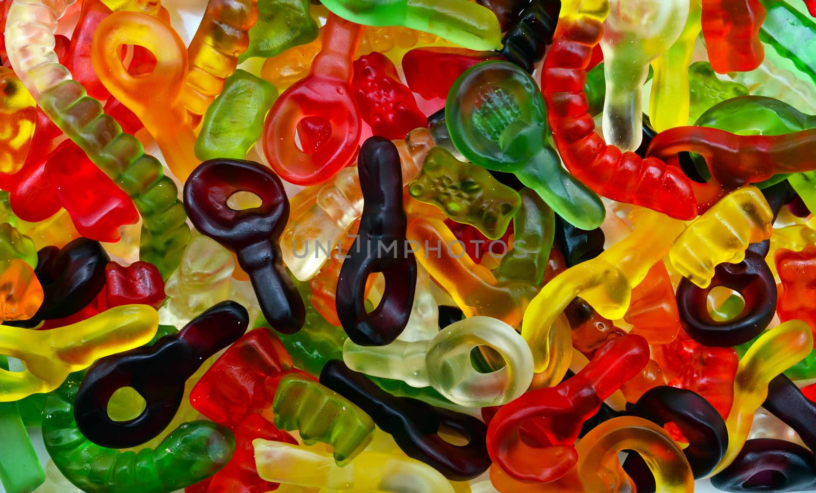 Assorted sweet candies jelly gum texture background
