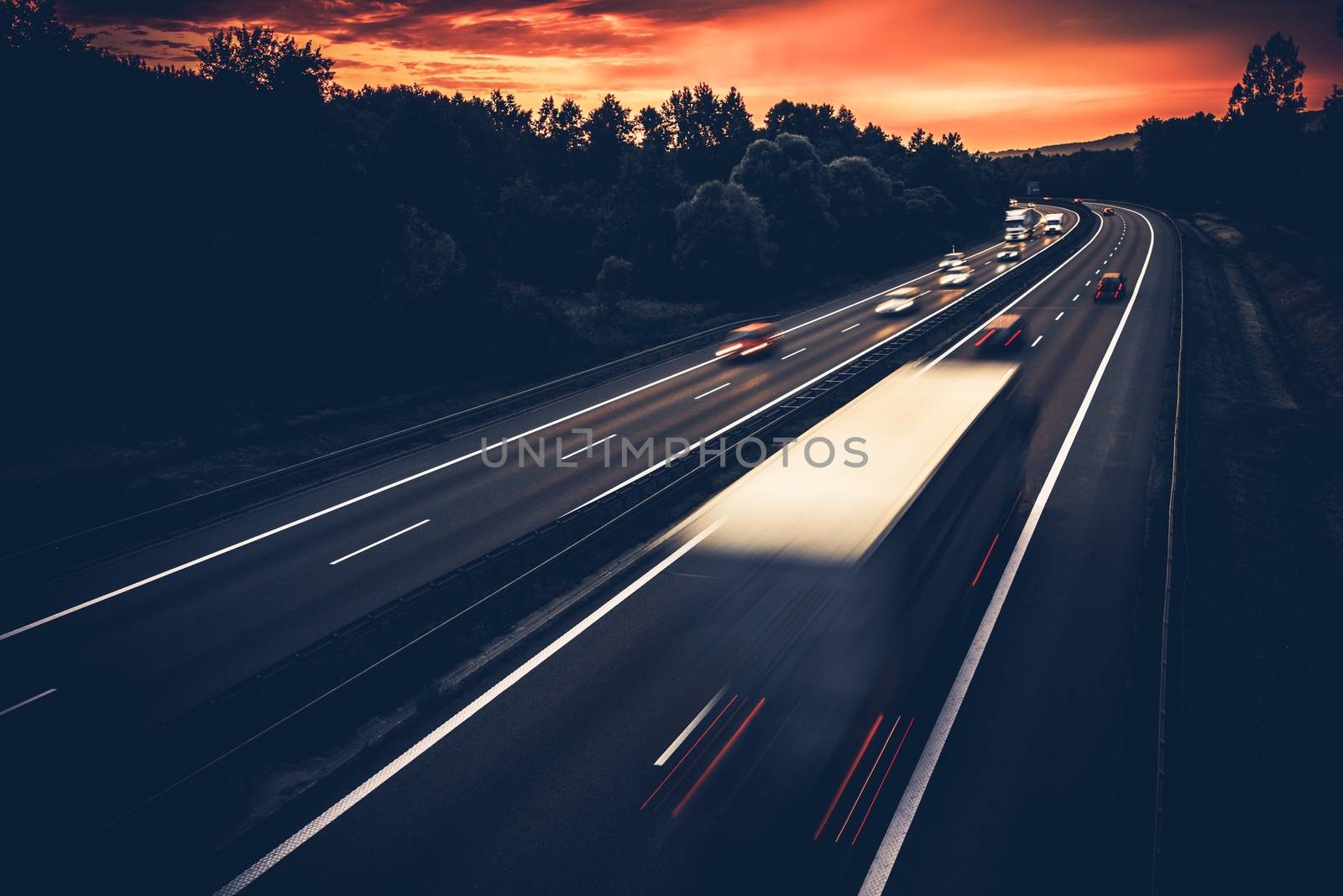 European Highway System. Speeding Cars and Trucks on a Modern Highway in Cracow, Poland, Europe. 