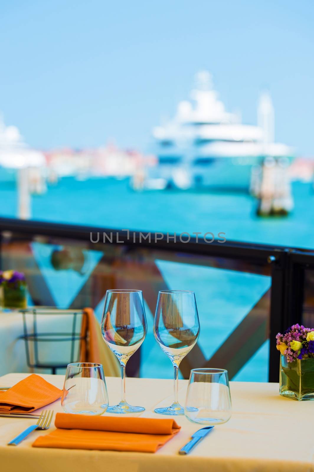 Italian Dinner in the Venice. Ready to Serve Elegant Restaurant Table in the Venice, Italy, Europe. Two Wine Glasses.