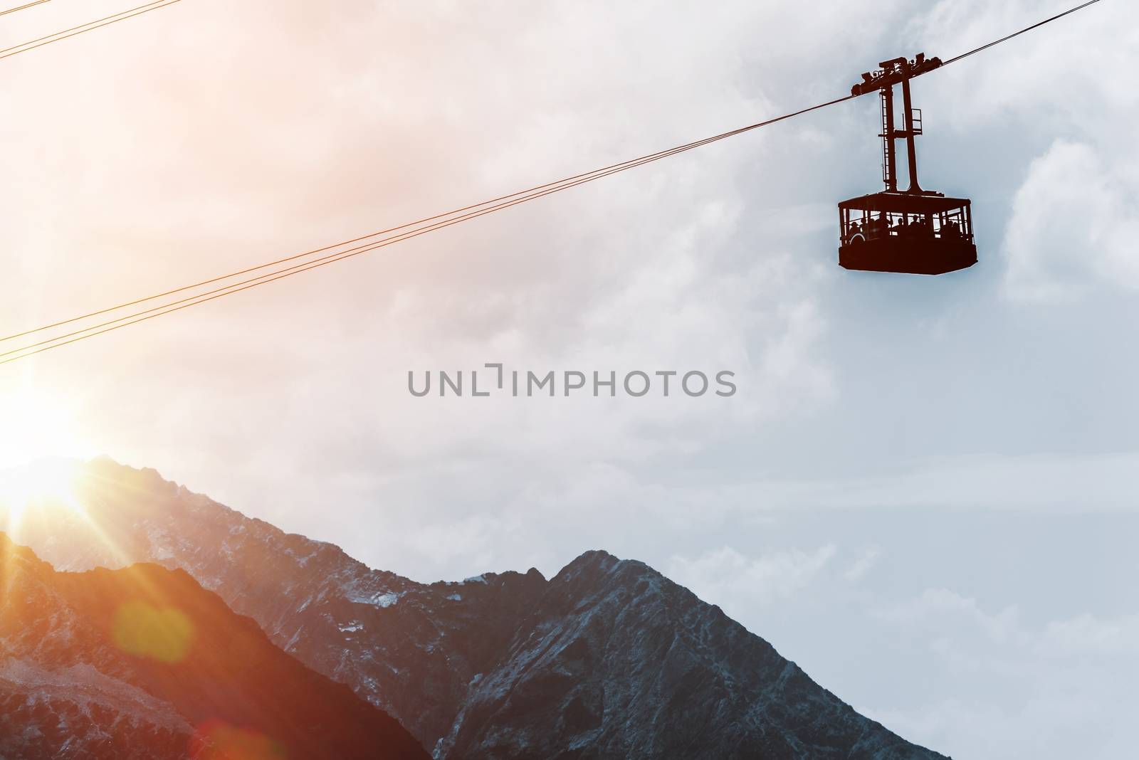 Mountains Gondola Lift at Sunset. European Alps Gondola Cable Car.