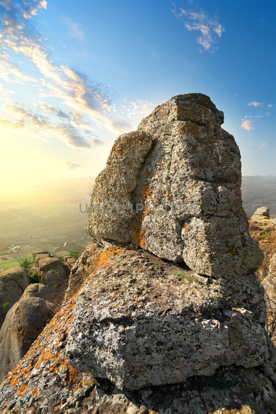 Big high rock and sunlight in the morning