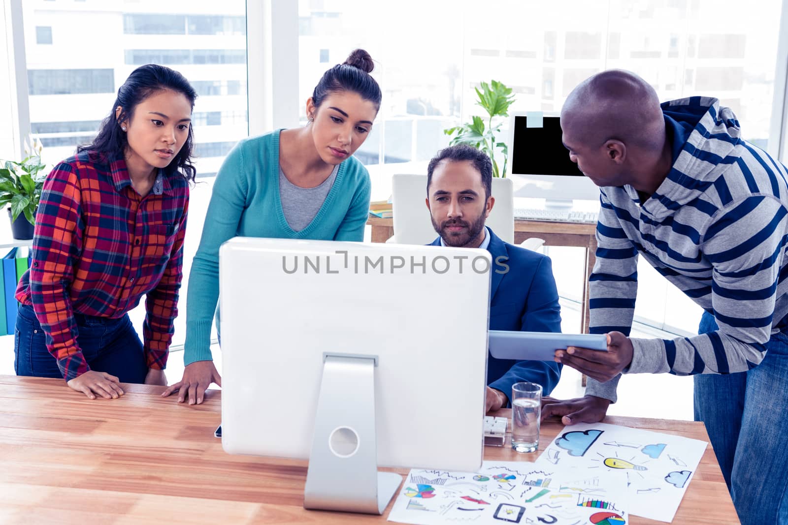 High angle view of business people at desk by Wavebreakmedia