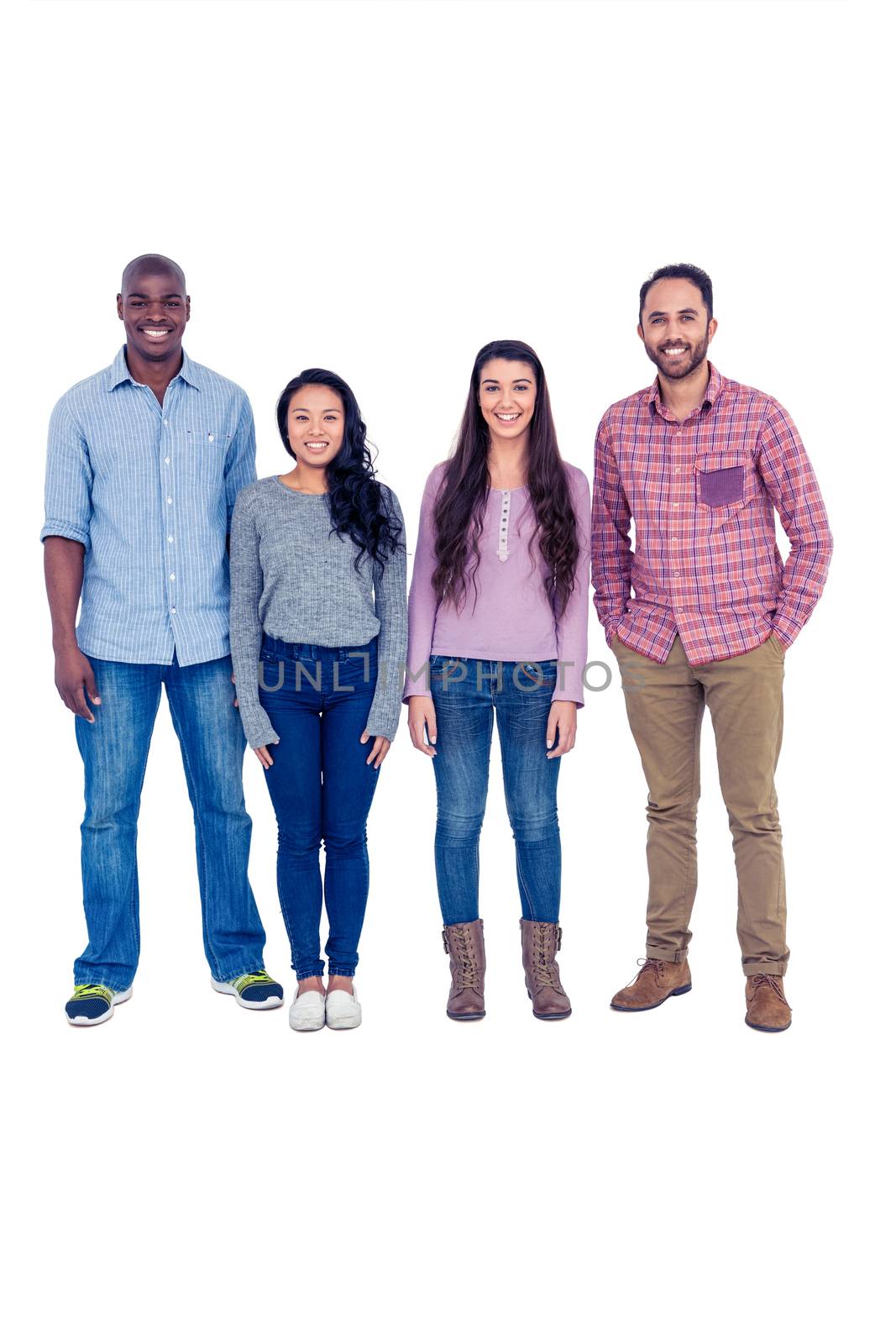 Full length portrait of multi-ethnic friends standing against white background