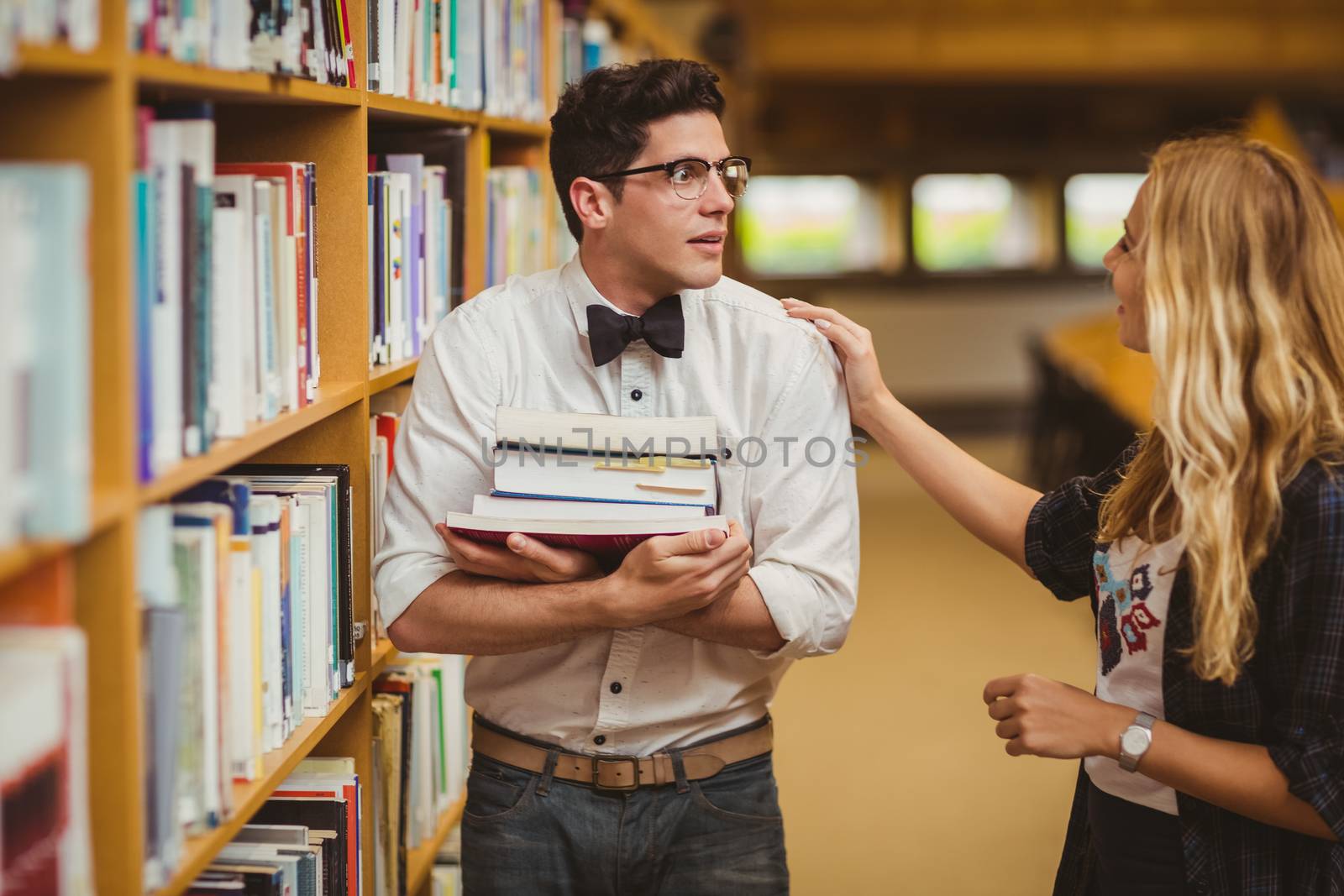 Embarrassed nerd meeting up a girl in library