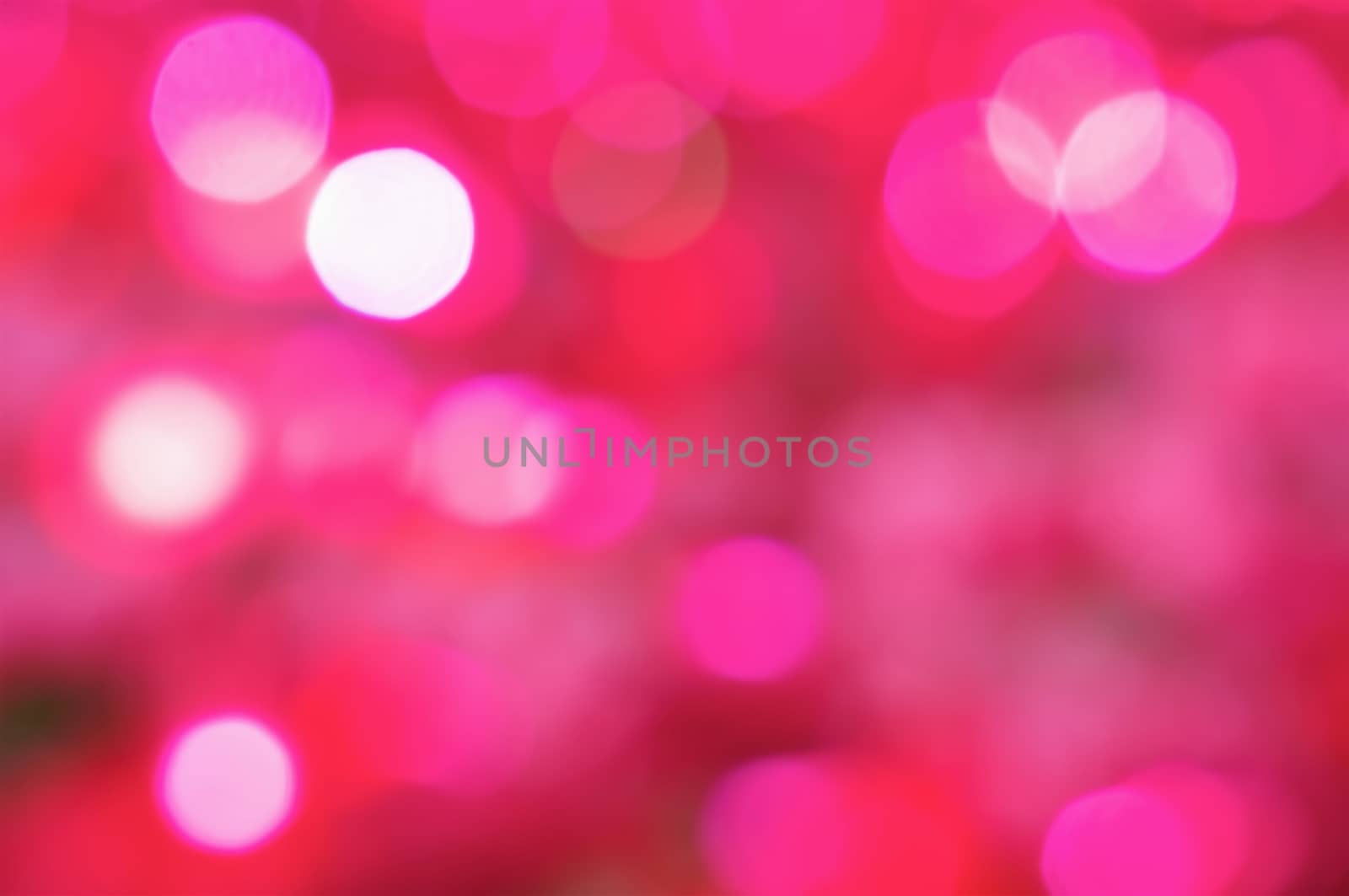 Defocused of glitter or pink bokeh circle at night as soft background.
