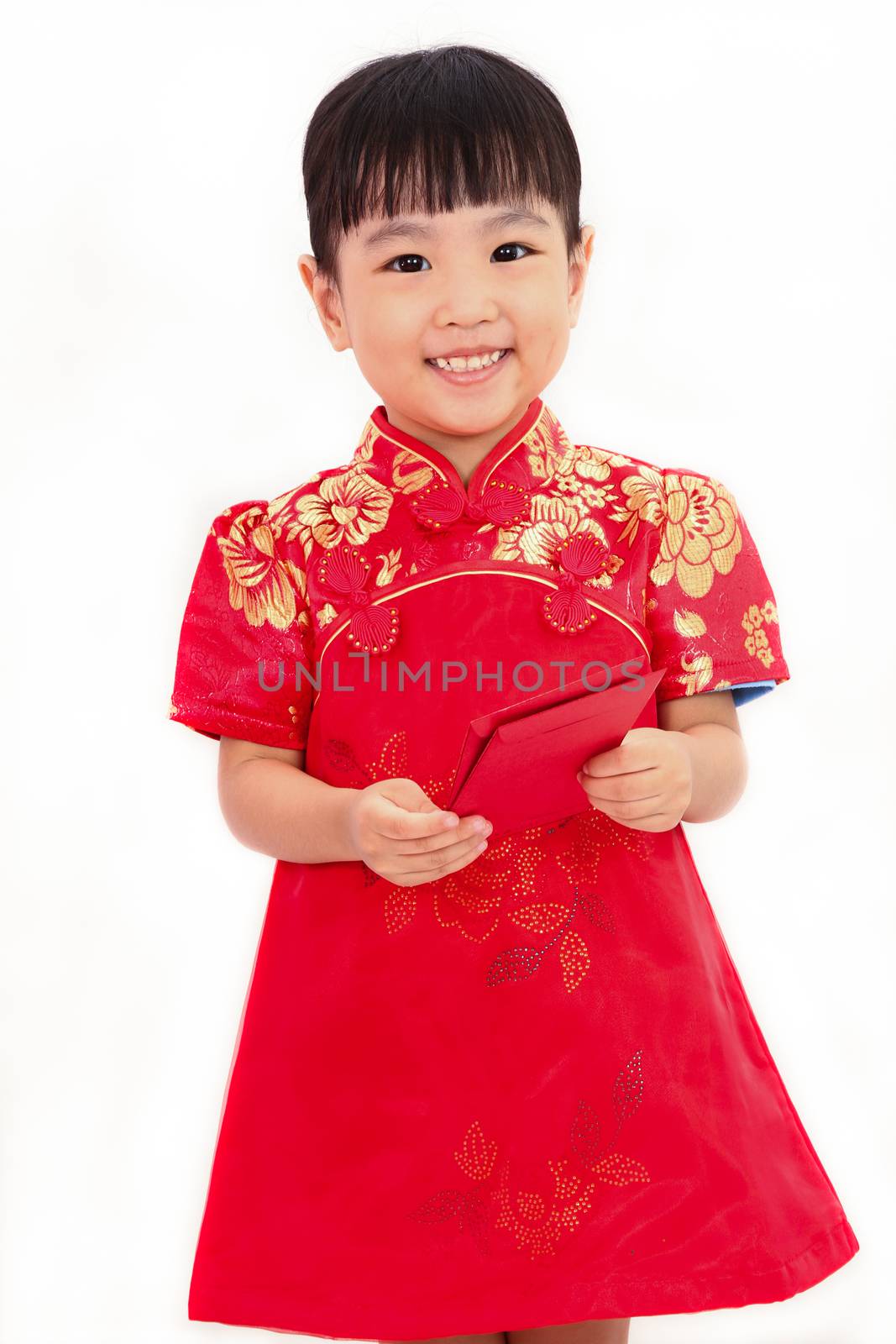 Chinese little girl holding red envelope greeting for Chinese New Year in plain white isolated background.